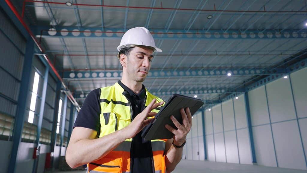 Customs officer using a tablet device